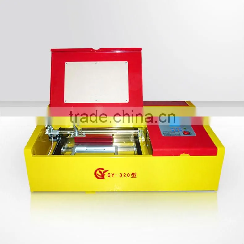Shandong small laser cheap acrylic laser engraving machine price/laser engraving machine