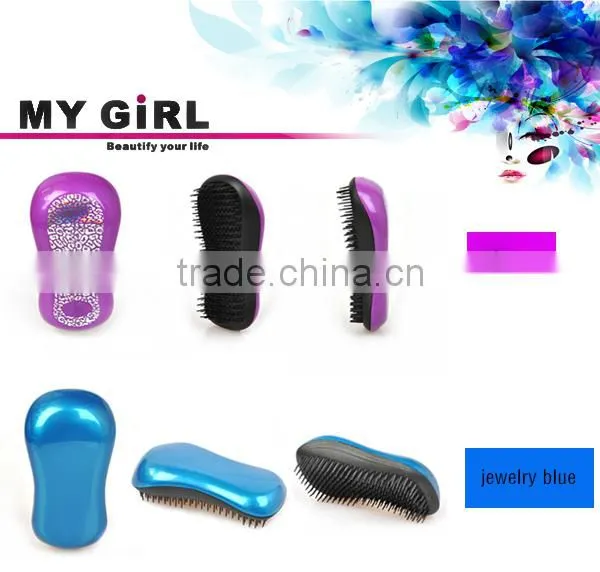 My girl hot new product Hair Tamer Turquoise Detangling Hair Brush Teezer