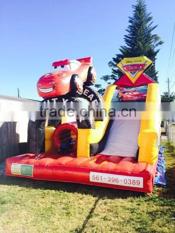 children play game inflatable slides with car obstacle for kids