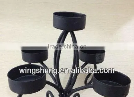 Romantic novelty design fashion black metal wine bottle candelabra/best seller wedding candlestick/ economic candle holder