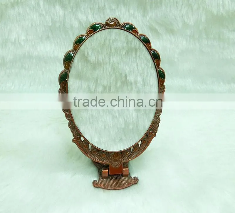 Red bronze cosmetic pocket mirror with rhinestone