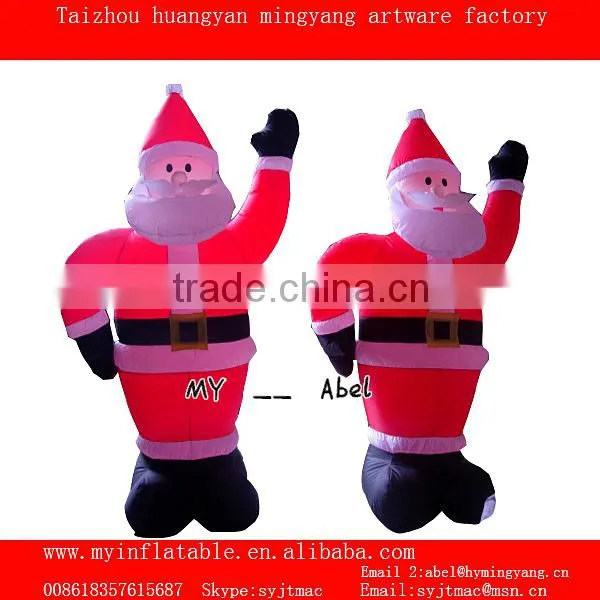 Christmas decorations santa and penguin by train