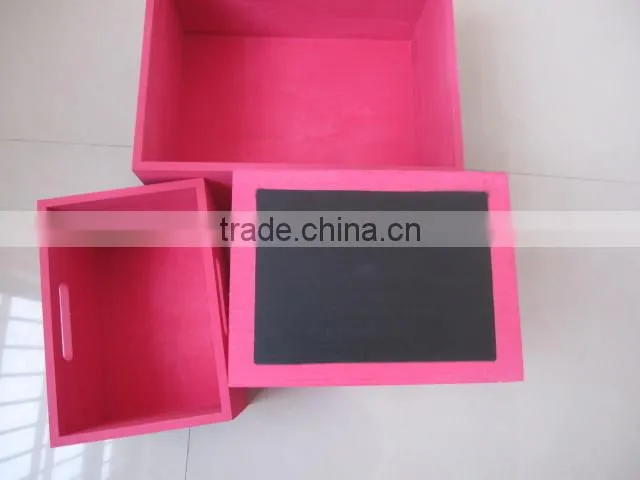 colorful wooden boxes with black board