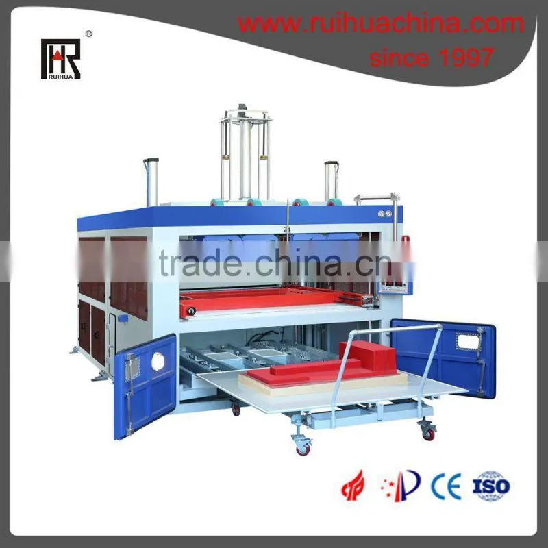 Door panel thermoforming machine