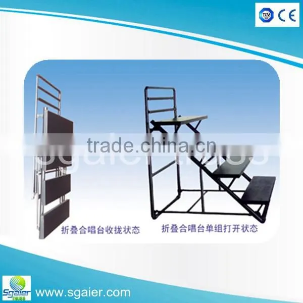 Auminum folding choral riser with plywood platforms