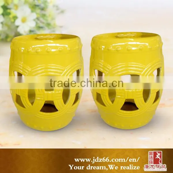 Yellow ceramic garden stool