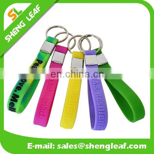 Hot sale silicone rubber bracelet key ring , 100% silicone wristband key chain , screen printing silicone keychain