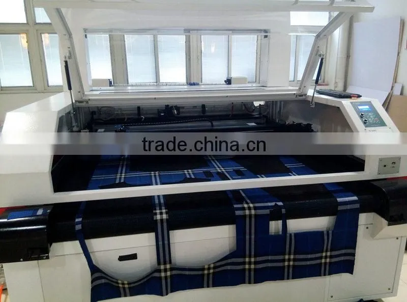 Vision Laser Cutting System for Patterned Fabrics Marker Matching