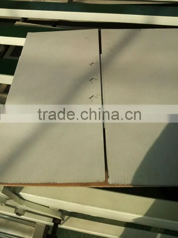 Corrugated carton box double pieces stitching machine