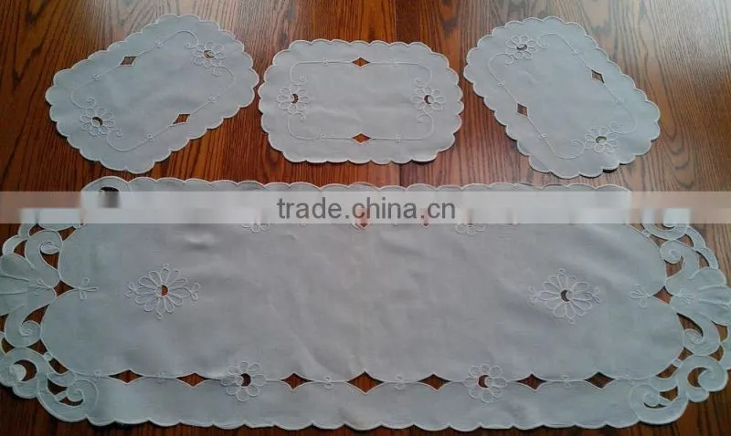 Cut work and hand embroidered table runner