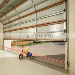 Automatic sectional garage door