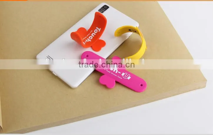 2014 promotional one touch silicone slap smartphone Holder