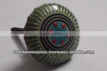 ceramic white knob with green circles