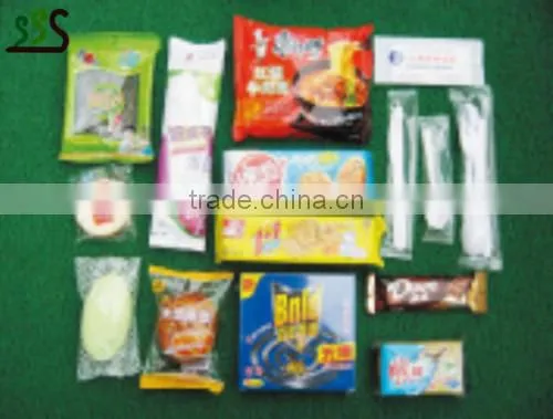 Double series automatic packaging machine for packing various solid objects
