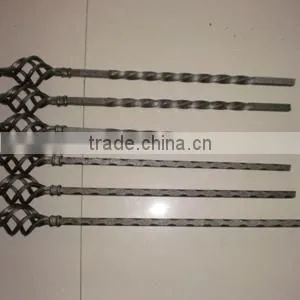 forged iron balusters with decorative baskets