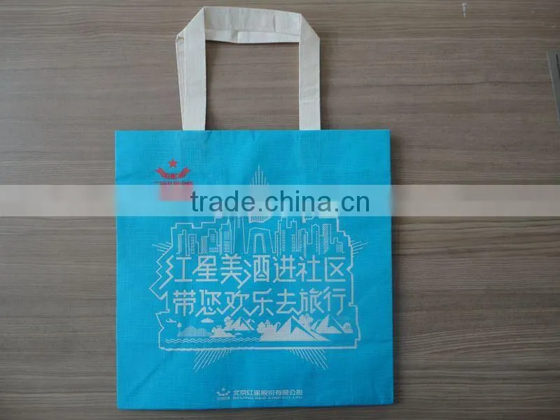 colored shopping kraft paper bag with ribbon handle
