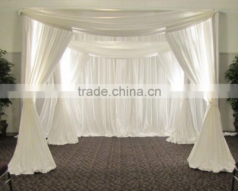 fancy and elegant pipe and drape wedding backdrop