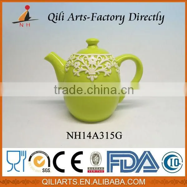 Delicate ceramic teapot with cup