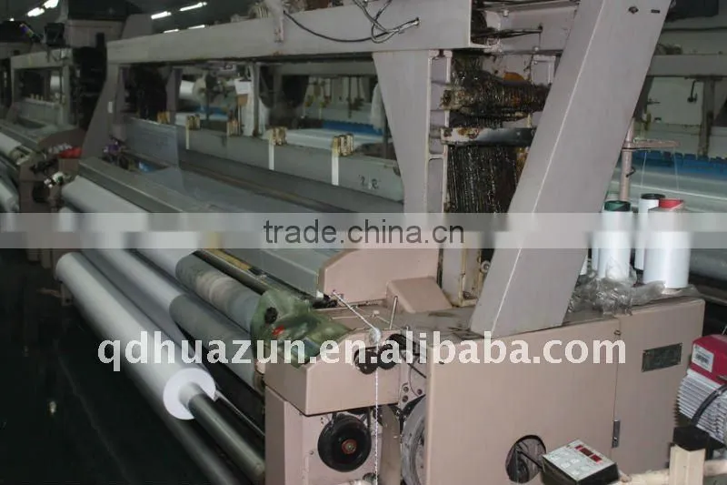 two nozzles water jet loom