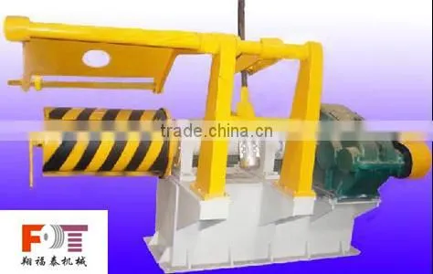 hydraulic coiler machine with hold down arms device