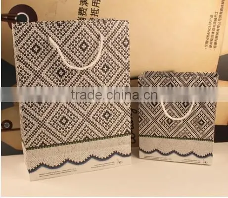 Custom exquisite gift paper bag for packing with handles