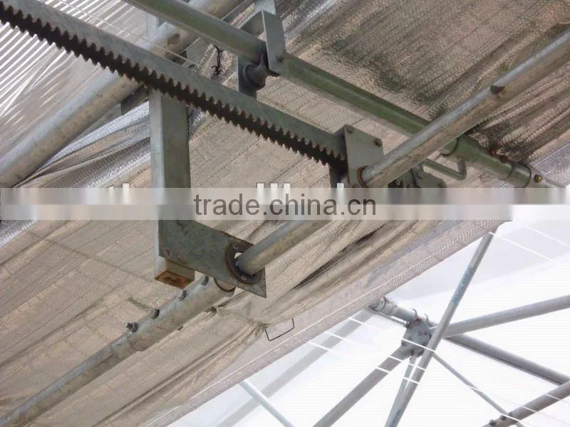 Shading pinion for greenhouse shading system