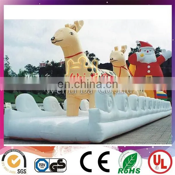 inflatable santa with sleigh and reindeer