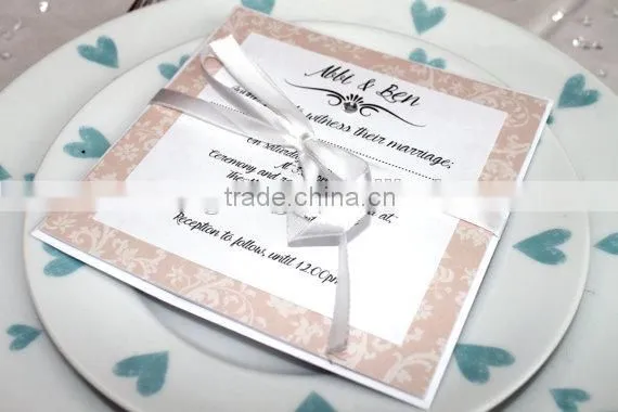 vintage flocking invitation card design with ribbon