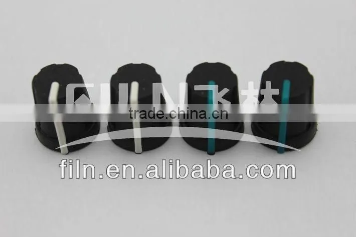 black miniature round bakelite door knobs