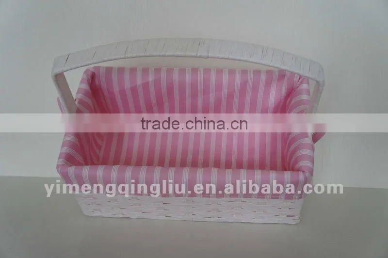 wicker storage basket with pink liners