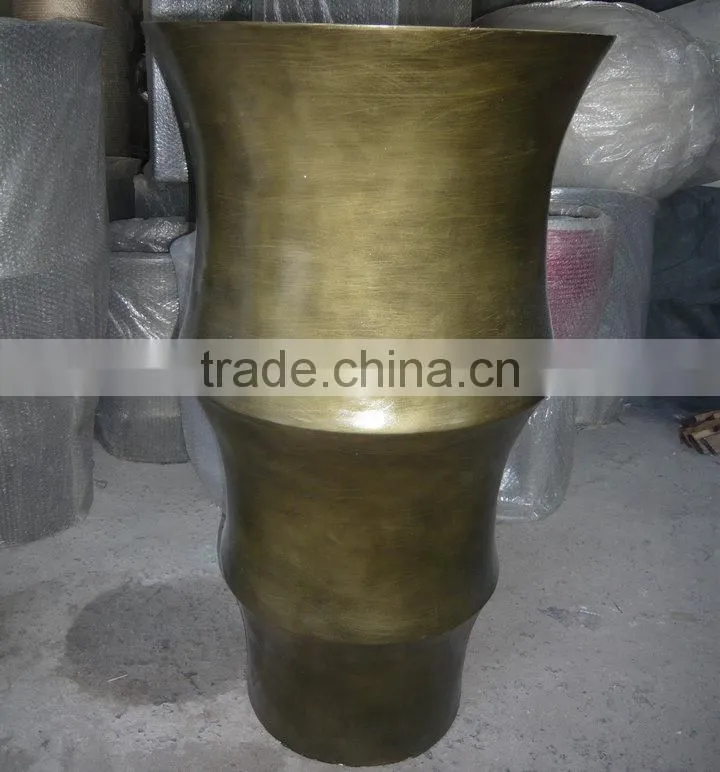 Golden fiberglass planter flowerpot