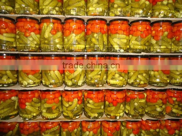 Pickled asorted cherry tomatoes and baby cucumbers