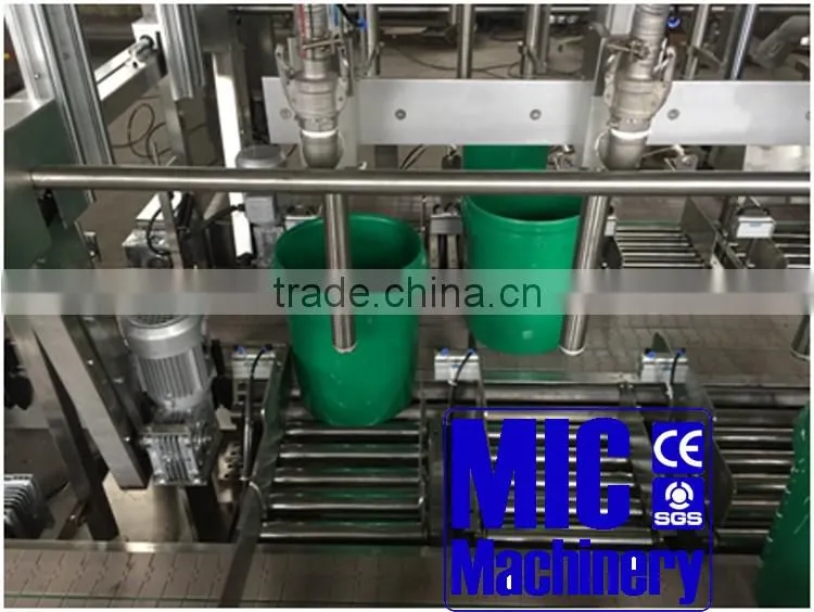 Micmachinery hot selling oil packing machine volumetric filling machine automatic engine oil filling machine