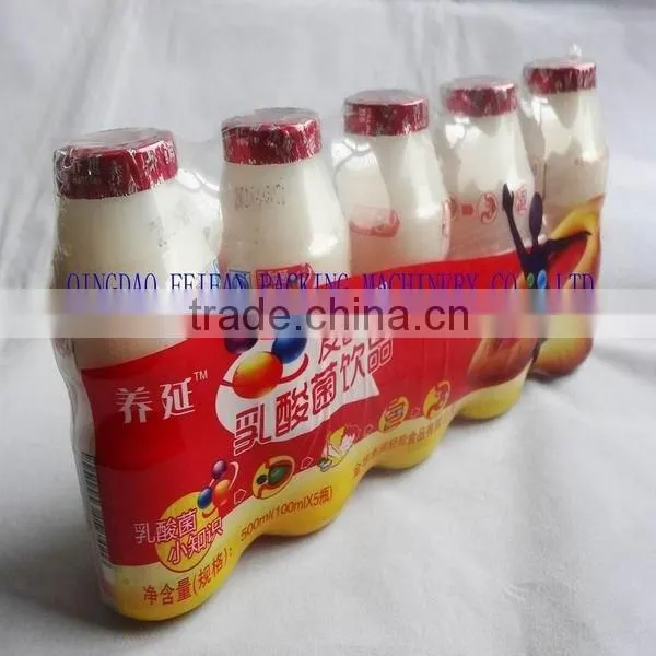 Omron PLC Control Automatic Yakult Bottles Heat Shrink Packing Machine