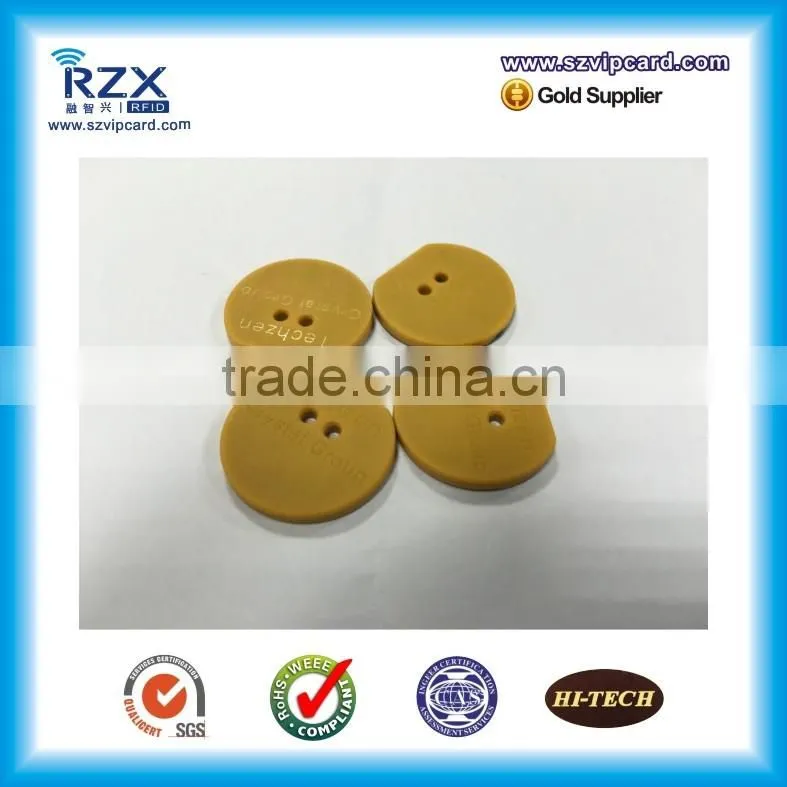 Reusable HF washable RFID laundry tag
