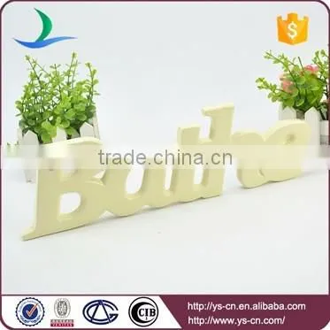 BATHE shape letters brand for bathroom indicator