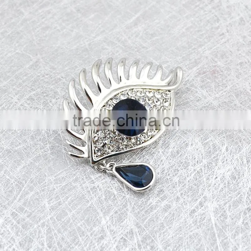Stylish decorative plating silver crystal rhinestone eyes design brooch for ladies
