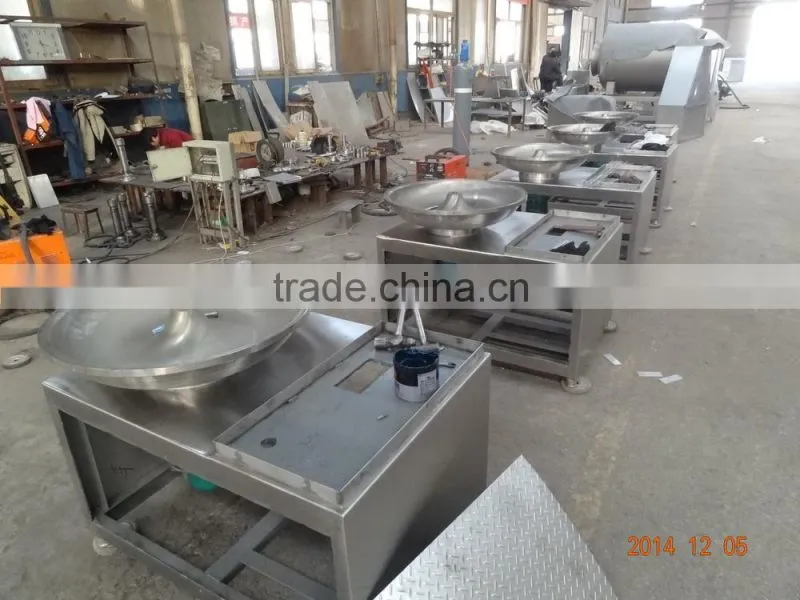 Meat cutting and blending machine
