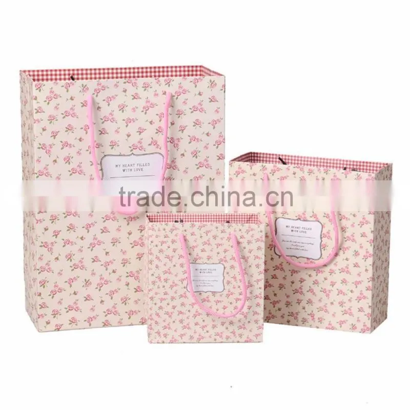 Handmade art paper 4C printing packaging handled paper bags