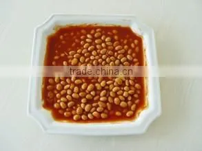 Delicious canned white kidney beans in tomato sauce