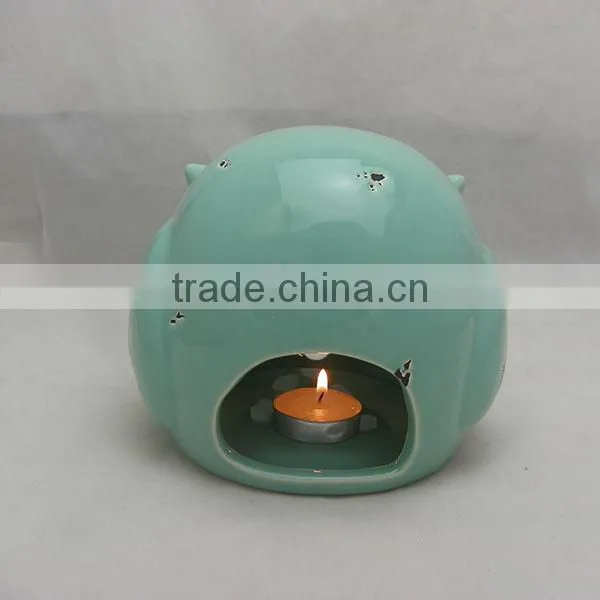 Ceramic owl shaped lanterns