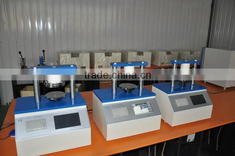 Paper board crush test machine