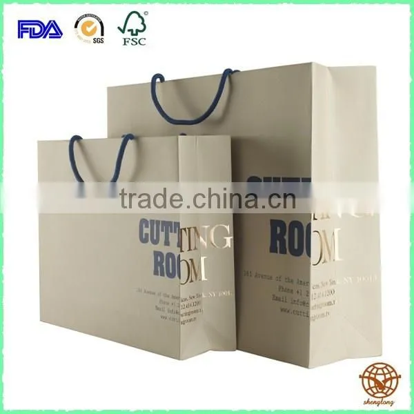Custom bulk paperboard carrier with black Ribbon