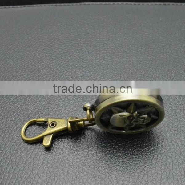 Sun god pocked watch with key chain