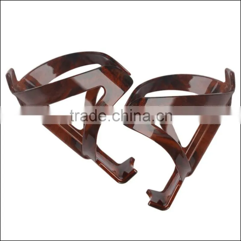 Production Wholesale mountain road bike cycling water bottle cage cup holder peach wood engineering materials PC Bottle Cage