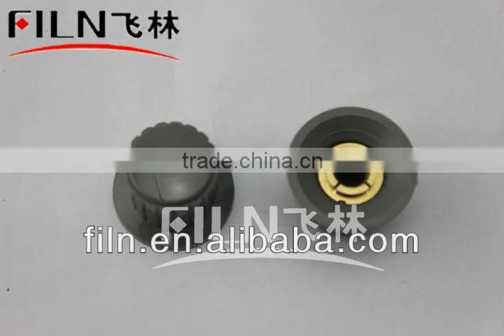 grey round point bakelite potentiometer knob
