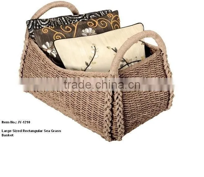 Narrow wicker magazine basket with wooden handles