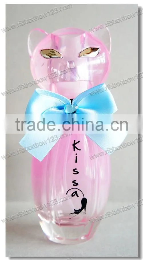 designs of ribbon flowers for perfume bottle