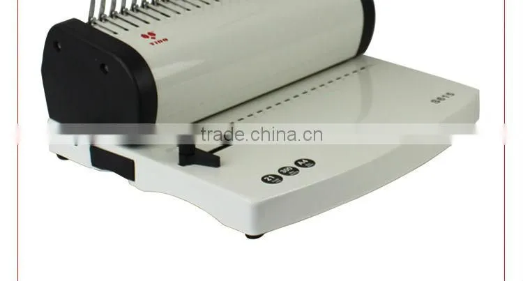 Spiral book binding machine