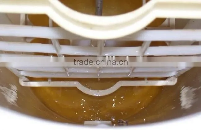 Automatic turn over honeycomb honey extracting machine